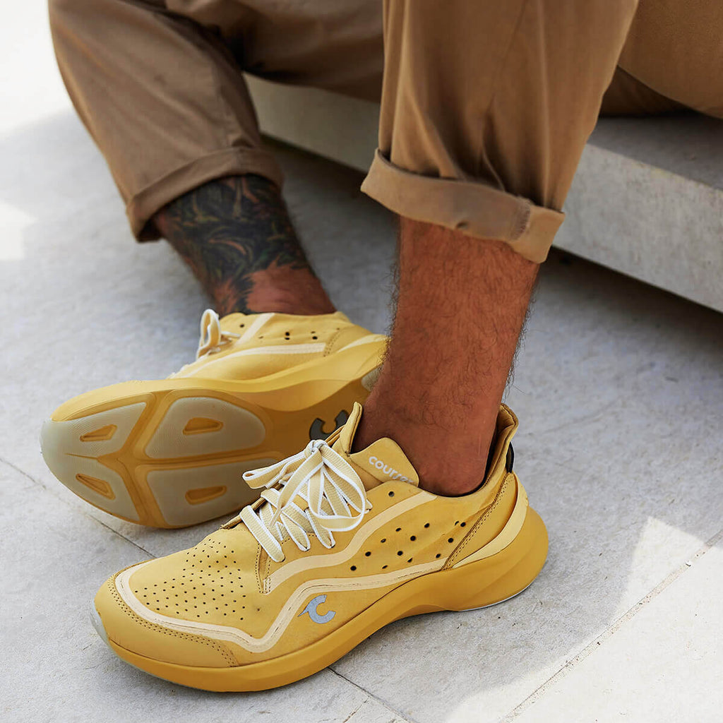 Man wearing Courser Uno Men's Golden Haze Mono Italian-Made Luxury Sneakers