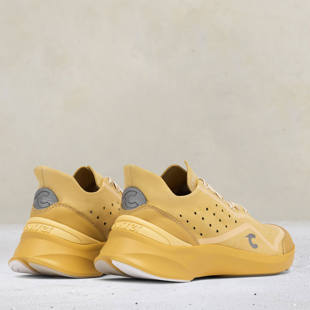 Heel view of Courser Uno Men's Golden Haze Mono Italian-Made Luxury Sneakers