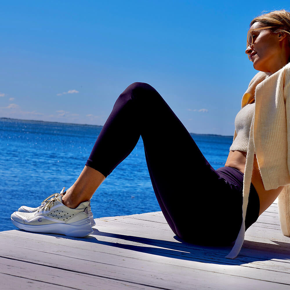 Woman wearing Courser Uno Women's White Mono Italian-Made Luxury Sneakers