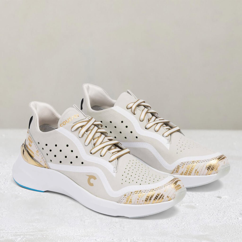Three-quarter view of Courser Uno Women's White Luxe Italian-Made Luxury Sneakers