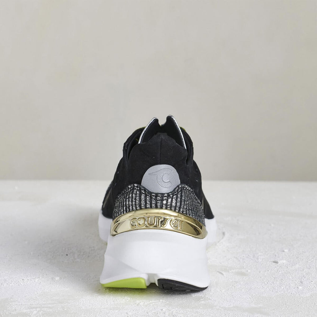 Heel view of Courser Uno Women's Black Luxe Italian-Made Luxury Sneakers