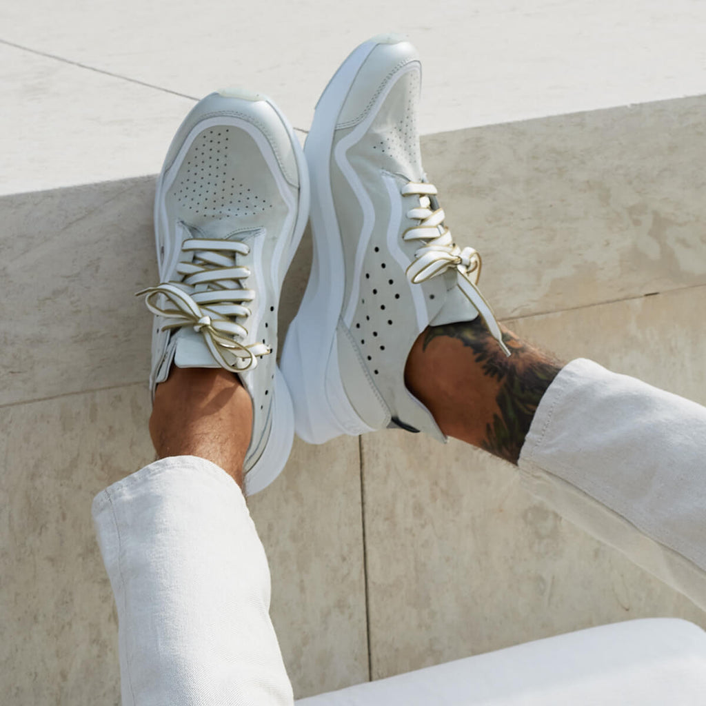 Man wearing Courser Uno Men's White Mono Italian-Made Luxury Sneakers