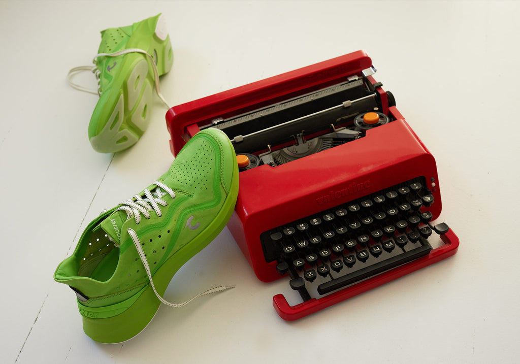 Courser Uno sneakers in Acid Green and a typewriter